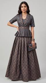Vasundhara Fashions black croptop lehenga with a pleated peplum jacket and chevron patterned skirt for teen girls