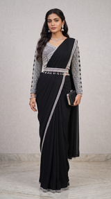 Vasundhara Fashions black pre-draped pleated saree with long-sleeve geometric embroidered blouse and embellished belt