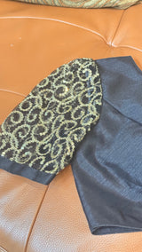 Vasundhara Fashions black blouse with gold sequin embellished sleeves and intricate pattern
