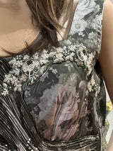 Vasundhara Fashions bottle green organza gown with floral digital print and intricate beaded embroidery on the bodice