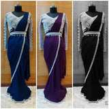 Vasundhara Fashions drape saree in purple and black with long-sleeved embroidered blouse and embellished waist belt