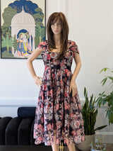 Vasundhara Fashions floral print party wear frock with cap sleeves and a flared skirt on a mannequin