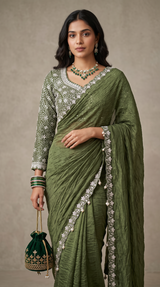 Vasundhara Fashions green crush Russian silk saree with heavy embroidered blouse and pearl-detailed border