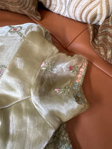 Vasundhara Fashions green organza saree featuring delicate floral embroidery and a matching designer blouse.
