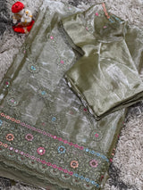 Vasundhara Fashions green organza saree with intricate floral embroidery and matching designer blouse