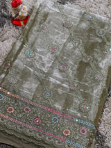 Vasundhara Fashions green organza saree featuring intricate floral embroidery with colorful sequins and mirror work