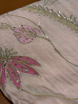 Vasundhara Fashions Kora embroidery saree in soft pink featuring intricate gold thread work and floral motifs