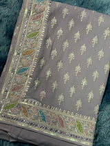 Vasundhara Fashions lavender chiffon saree with intricate multi-colored floral Chikankari embroidery and sequin border.