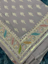 Vasundhara Fashions lavender chiffon saree with intricate Chikankari embroidery, sequin motifs, and floral border.