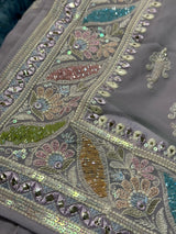 Vasundhara Fashions lavender chiffon saree with intricate multi-colored floral embroidery, sequins, and beadwork border