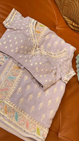 Vasundhara Fashions lavender chiffon saree with intricate multi-colored floral Chikankari embroidery and sequin detail
