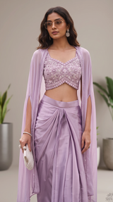 Vasundhara Fashions lavender croptop cape set with intricate embroidery, paired with a matching draped skirt.