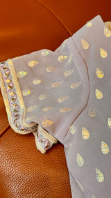 Vasundhara Fashions lavender chiffon blouse sleeve with teardrop sequin motifs and embellished beaded border