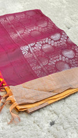 Vasundhara Fashions magenta Uppada Pattu silk saree with intricate silver zari floral motifs and a gold border