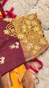 Vasundhara Fashions maroon Uppada Pattu silk saree with intricate gold and white beaded floral embroidery border