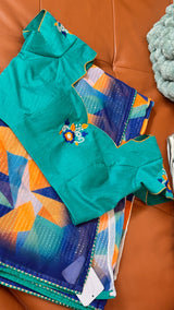 Vasundhara Fashions abstract multicolor chiffon saree with a teal embroidered blouse featuring floral detailing