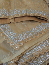 Vasundhara Fashions mustard organza saree with intricate silver sequin embroidery and scalloped border detail