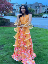 Vasundhara Fashions orange organza croptop lehenga with digital floral print and ruffled dupatta worn by a woman