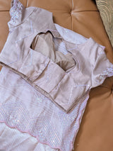 Vasundhara Fashions light pink and purple organza saree with intricate sequin embroidery and matching blouse