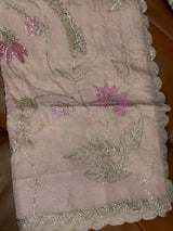Vasundhara Fashions peach kora saree with intricate pink floral embroidery, silver zari work, and scalloped borders.