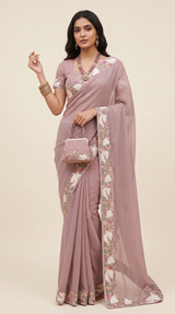 Vasundhara Fashions pink chiffon saree with intricate floral embroidery, sequin details, and matching handbag