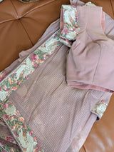 Vasundhara Fashions pink chiffon saree featuring intricate floral embroidery, sequin details, and a matching blouse.