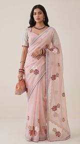 Vasundhara Fashions light pink chiffon saree with floral sequin embroidery and matching embellished blouse