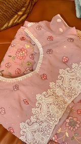 Vasundhara Fashions pink Chikankari saree with intricate floral embroidery and a matching stitched blouse