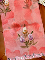 Vasundhara Fashions pink organza saree featuring delicate hand-painted floral rose motifs and a mirror-work border.