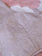 Vasundhara Fashions pink organza saree featuring delicate floral embroidery with subtle sequin detailing