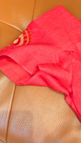 Vasundhara Fashions pink organza saree fabric with intricate gold and red thread embroidery detail