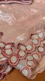 Vasundhara Fashions pink organza saree featuring intricate floral embroidery with sparkling crystal sequins