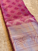 Vasundhara Fashions pink Kanchipuram pattu silk saree with intricate silver zari floral motifs and a wide ornate border