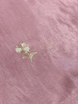 Vasundhara Fashions pastel pink soft tissue saree featuring delicate floral Resham thread embroidery detail