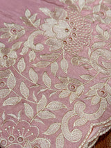 Vasundhara Fashions pastel pink soft tissue saree featuring intricate floral Resham embroidery and delicate cutwork.