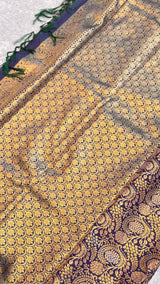 Vasundhara Fashions mix pattu silk saree in deep purple with intricate gold zari leaf pattern and green tassels