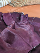 Vasundhara Fashions purple organza saree featuring shimmering silver horizontal lines and a beaded scalloped border.