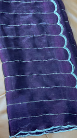 Vasundhara Fashions purple organza saree with silver horizontal lines and a scalloped beaded border