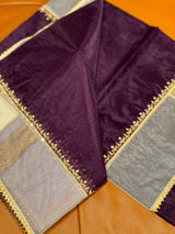 Vasundhara Fashions deep purple velvet saree with intricate gold floral embroidery and sheer metallic border