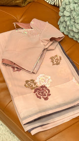 Vasundhara Fashions light pink chiffon saree with floral sequin embroidery and matching embellished blouse