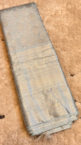 Vasundhara Fashions light blue Kanchipuram pattu silk saree with intricate silver zari floral and paisley patterns