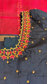 Vasundhara Fashions Uppada Pattu silk saree featuring a dark blue blouse with intricate pink and gold floral embroidery