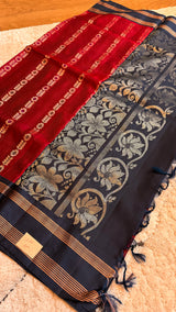 Vasundhara Fashions Uppada Pattu silk saree in deep red and black with intricate gold zari floral border and tassels