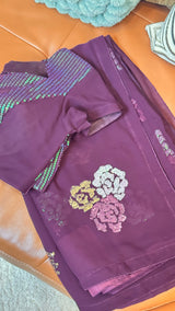 Vasundhara Fashions wine chiffon saree with floral sequin motifs and matching sequin-embellished blouse