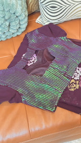 Vasundhara Fashions wine chiffon saree with a matching blouse featuring a high-shine green and purple sequin panel.